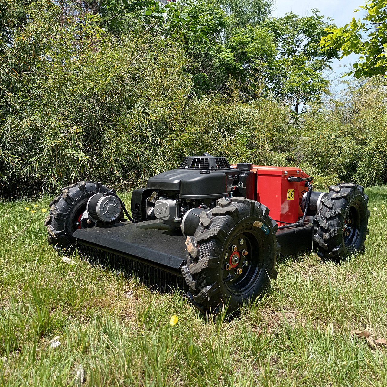 Robotic utility vehicle on grassy terrain