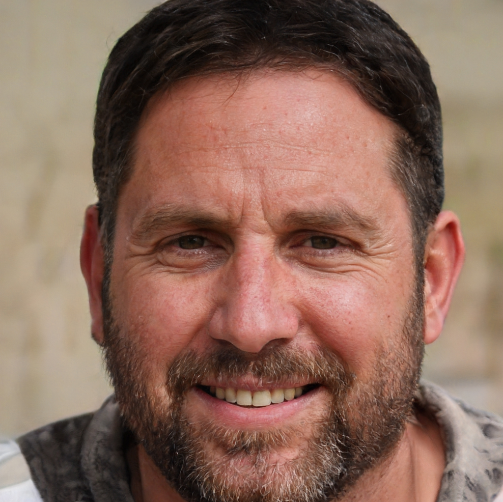 Smiling middle-aged man with beard close-up